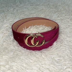 Hot pink belt with gold buckle